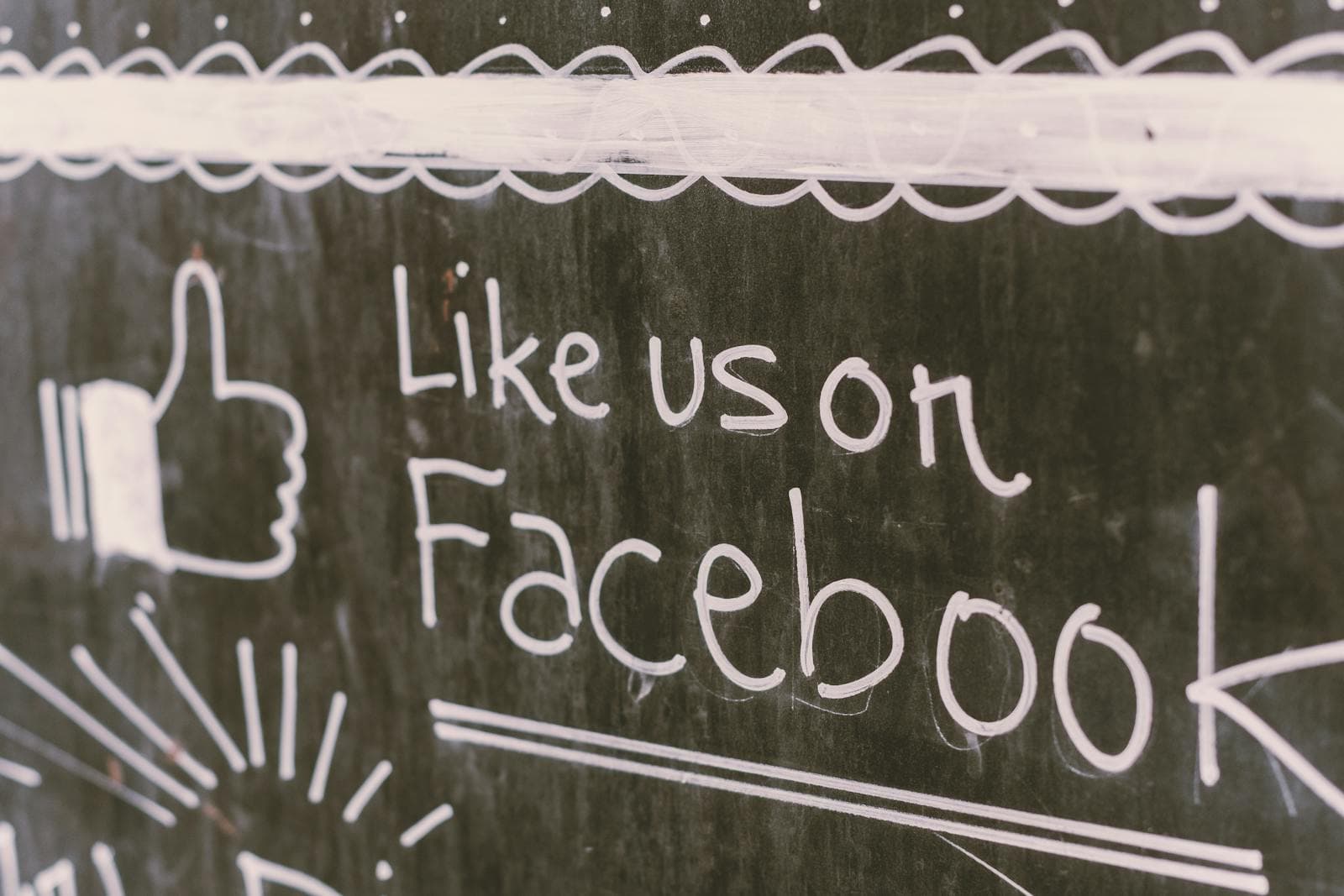 facebook engagement, Chalkboard art promoting Facebook engagement with a like us message.