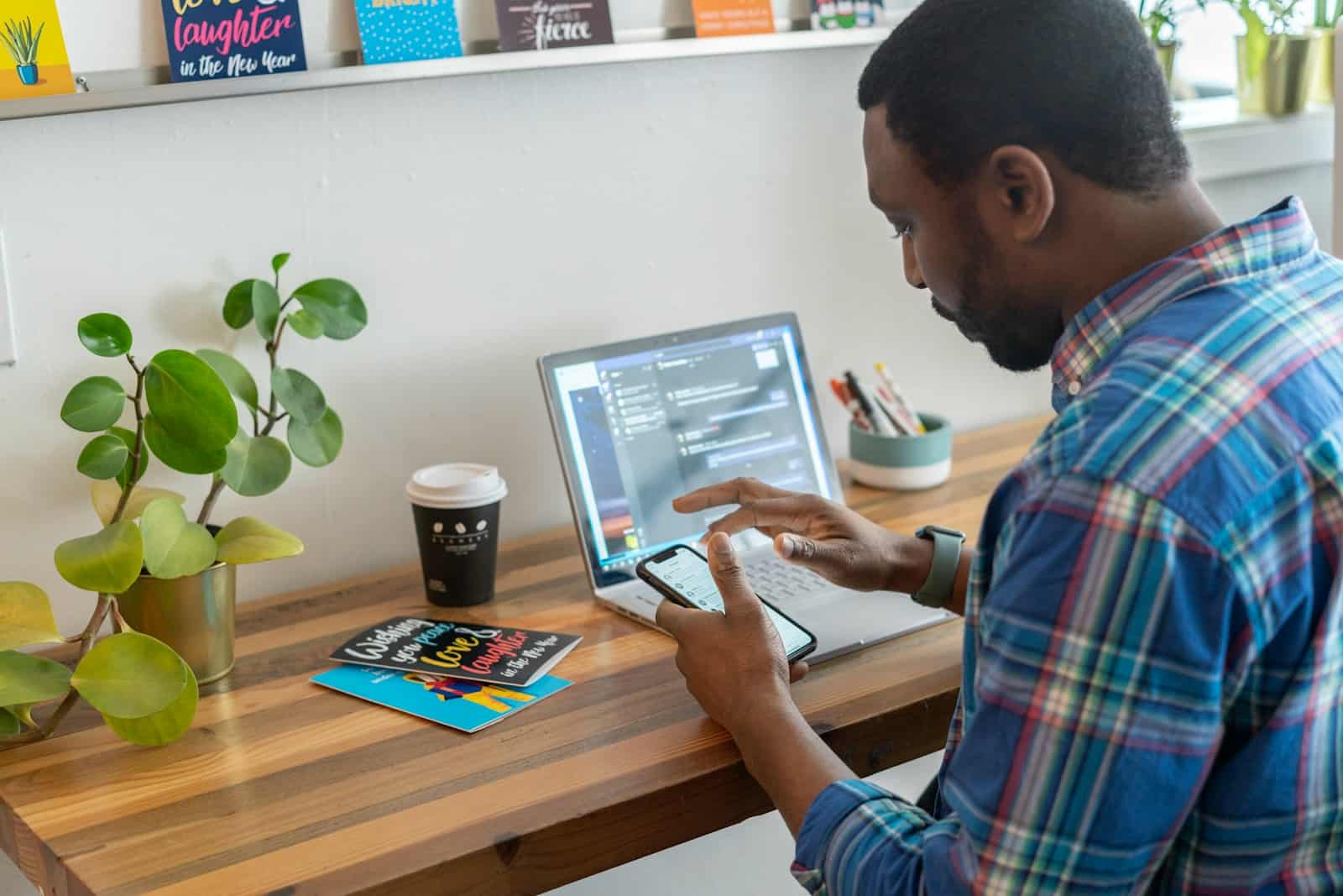 Linkedin, Group, Networking, Lead Generation, man in blue and red plaid dress shirt using silver ipad